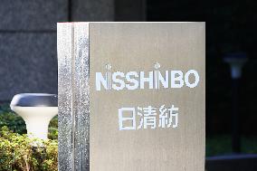 Nisshinbo Holdings Inc. signage and logo